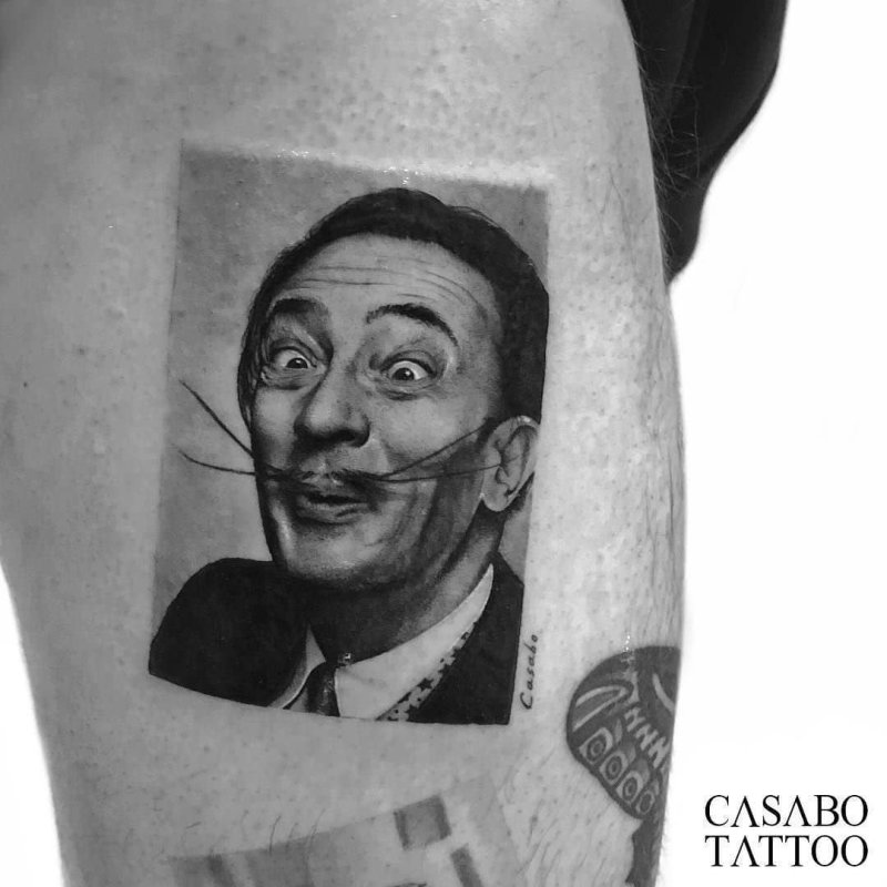 Salvador Dali happy self portrait tattoo
